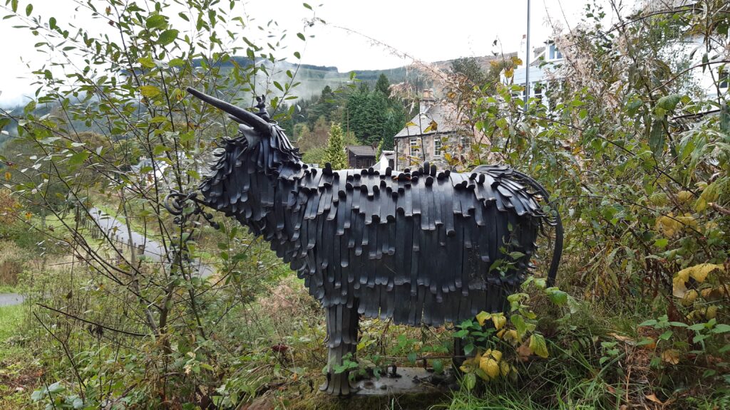 Hairy Coo statue in Strathyre