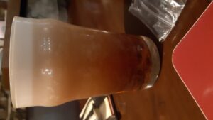 It's settling, just like I'm settling into the cosy pub