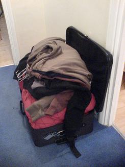 Step 1 - Fill suitcase to unimaginable levels